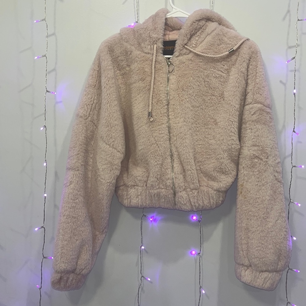 The color is actually light pink and it from rainbow size large